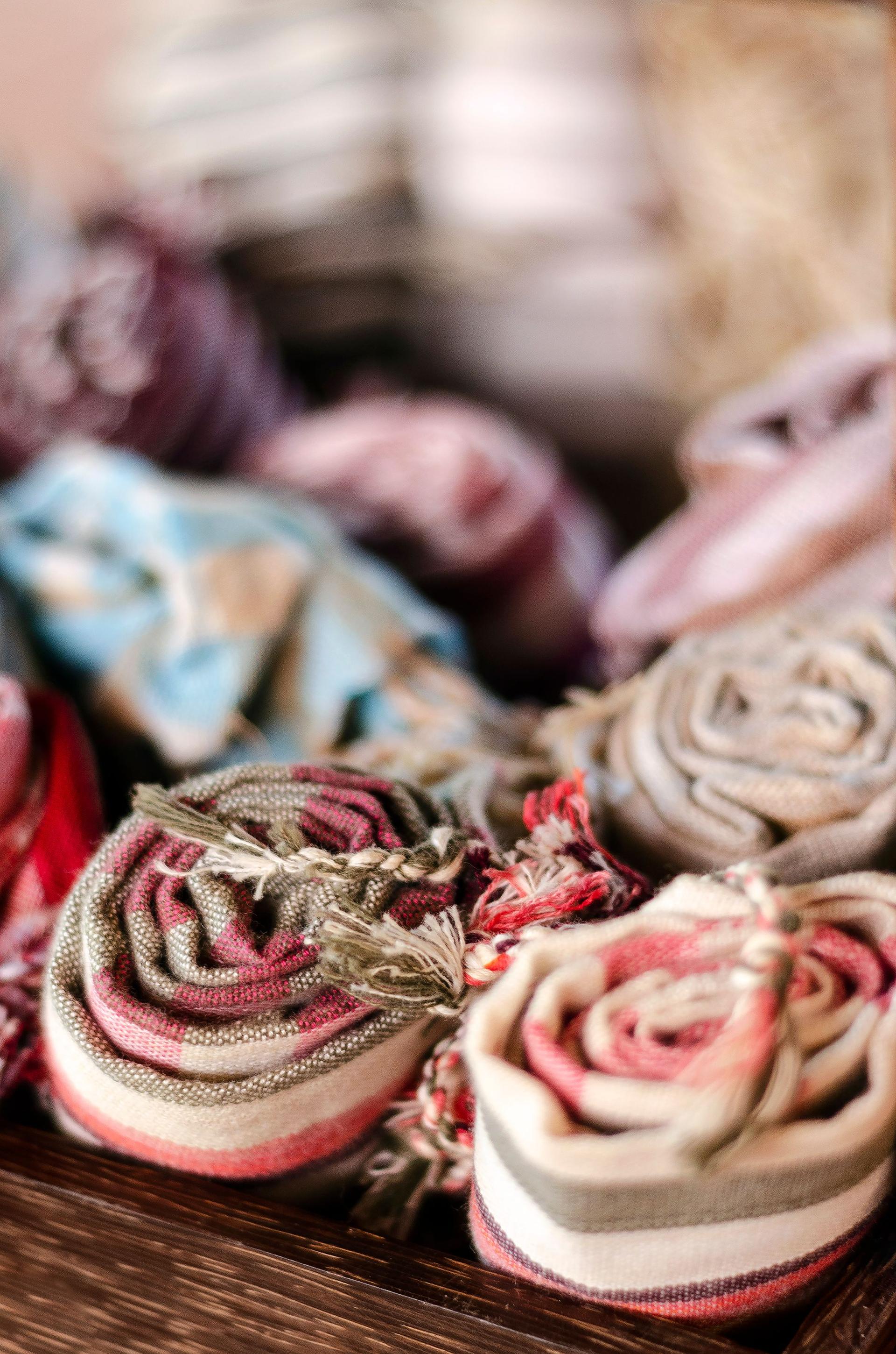 mixed traditional krama cotton scarf souvenirs detail on display at shop in angkor wat in cambodia