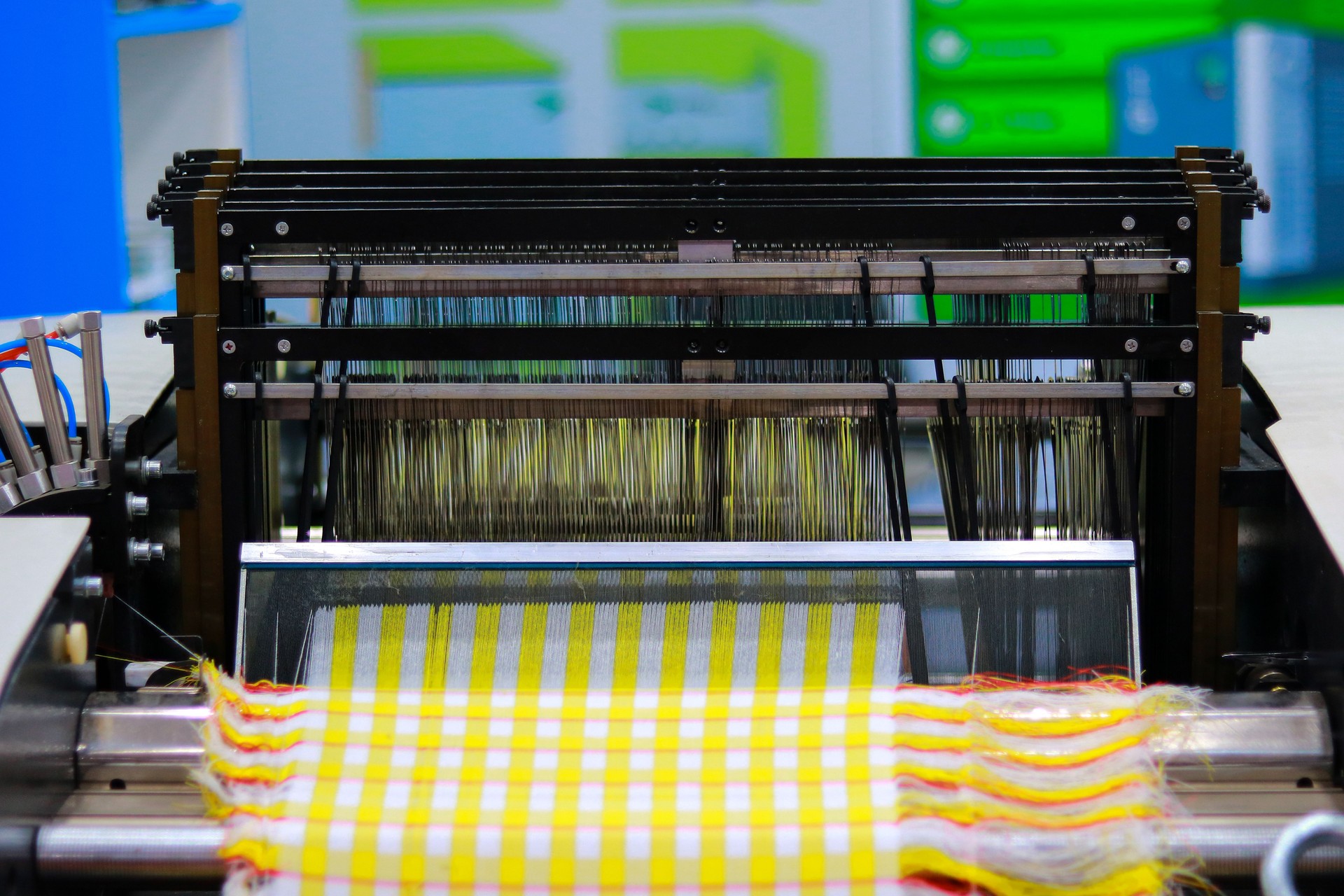 Production line of the cotton fabric factory. Textile industry. Industrial background